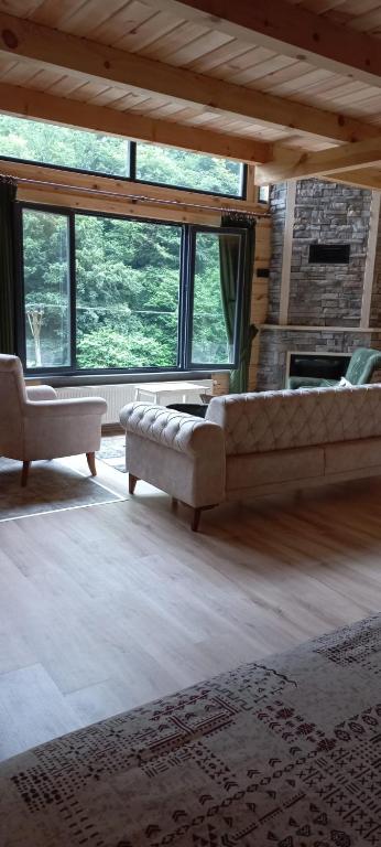 A seating area at AYDER LEVUT Bungalov