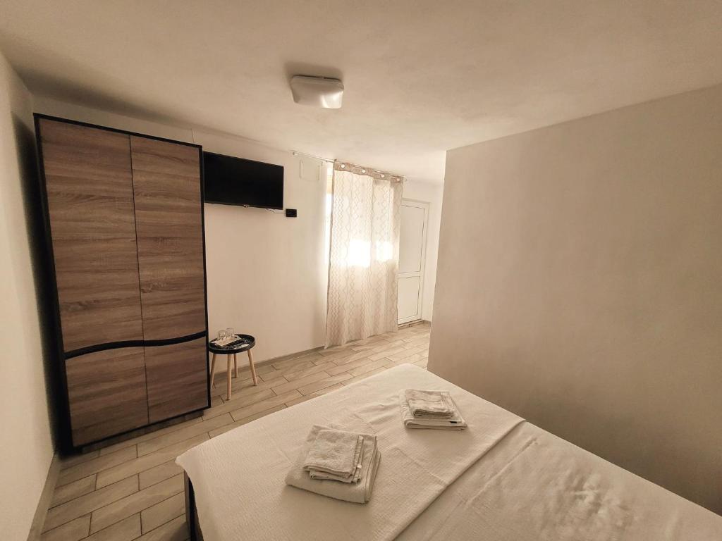 Postel nebo postele na pokoji v ubytování Cabana Vărad Coronini