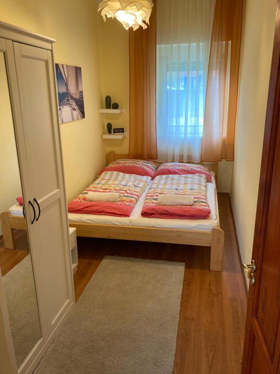 Posteľ alebo postele v izbe v ubytovaní Révai Apartman Fonyód