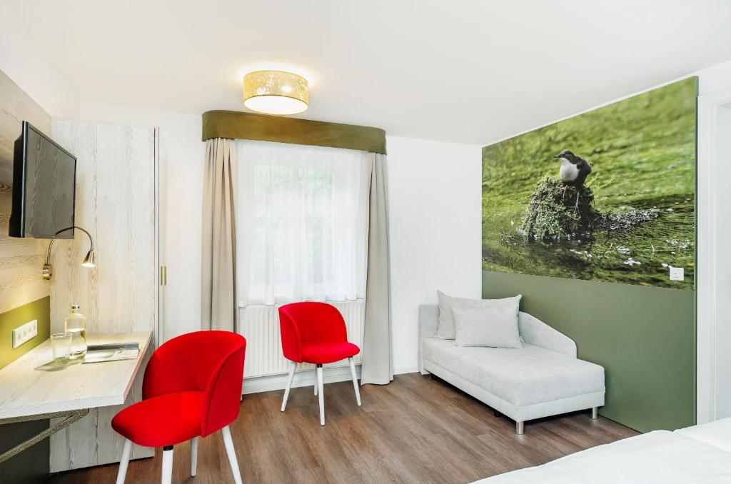 TV a/nebo společenská místnost v ubytování Hotel Forsthaus