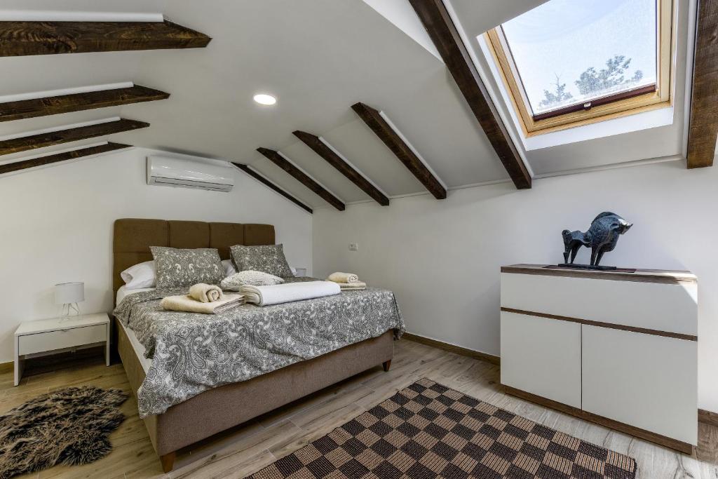 Posteľ alebo postele v izbe v ubytovaní Apartment Yula