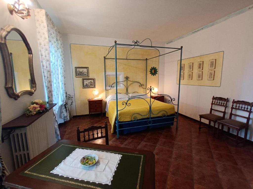 Postel nebo postele na pokoji v ubytování Guest House La Carolina