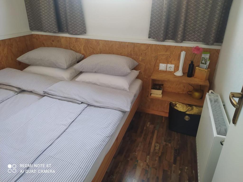 Postel nebo postele na pokoji v ubytování Studio apartman Gradna