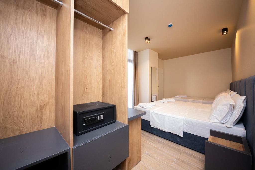 Postel nebo postele na pokoji v ubytování Hotel Alion21