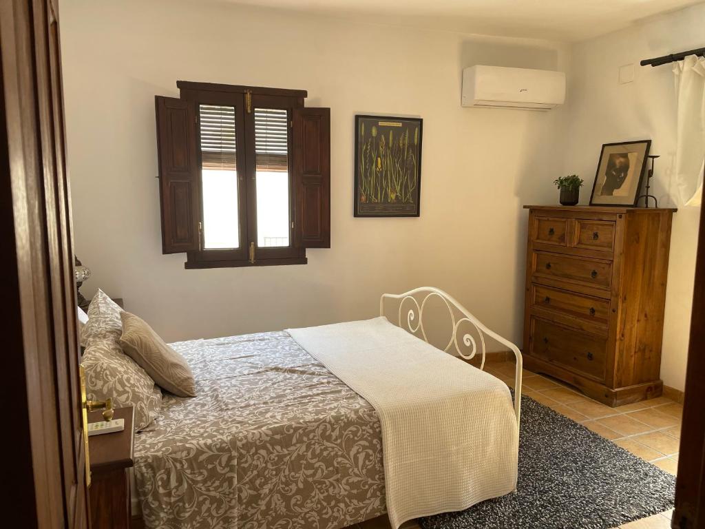 Cama o camas de una habitación en Casa Abuela, cheerful cosy 2 bedroom whitewashed village house