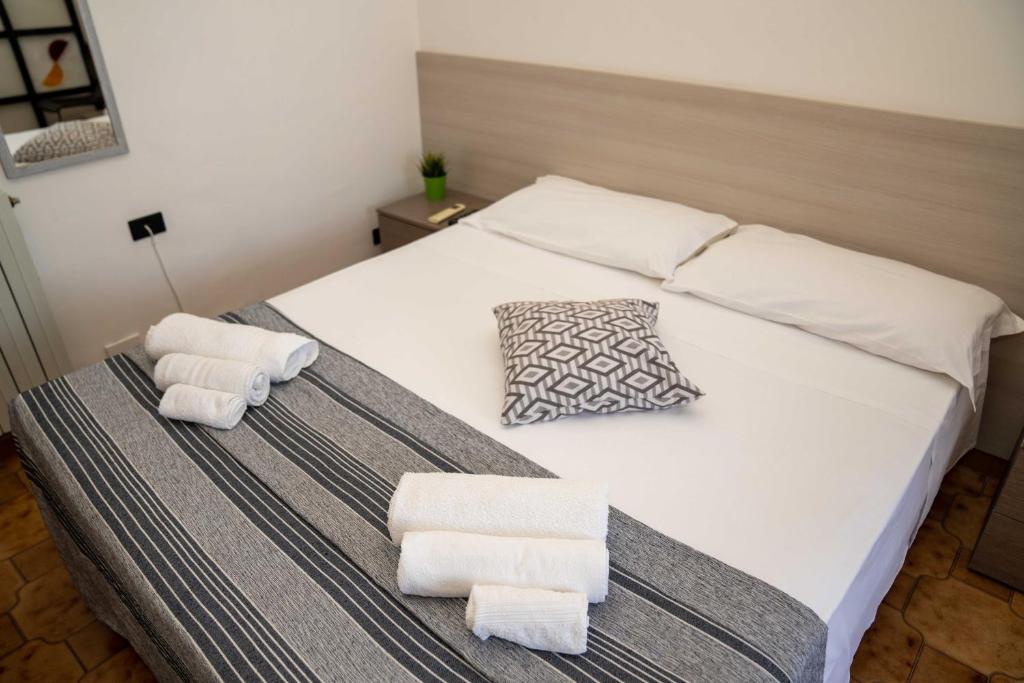 Postel nebo postele na pokoji v ubytování Queen's Bed & Breakfast