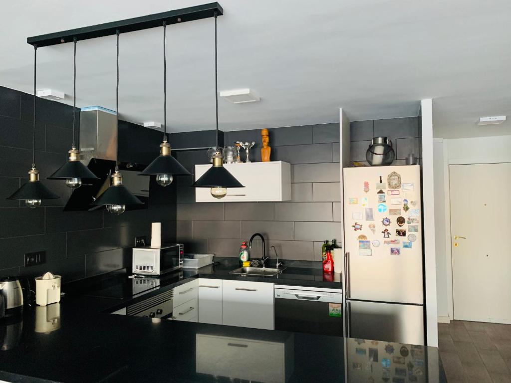 A kitchen or kitchenette at Excellent view Julia
