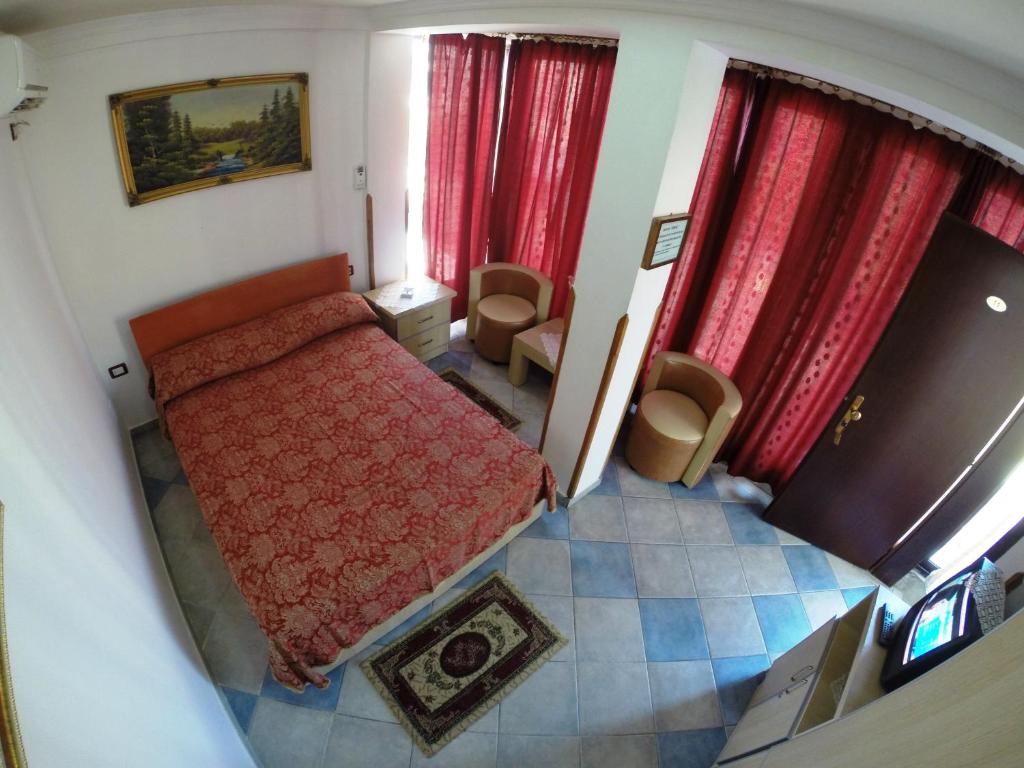 Postel nebo postele na pokoji v ubytování Hotel Ideal