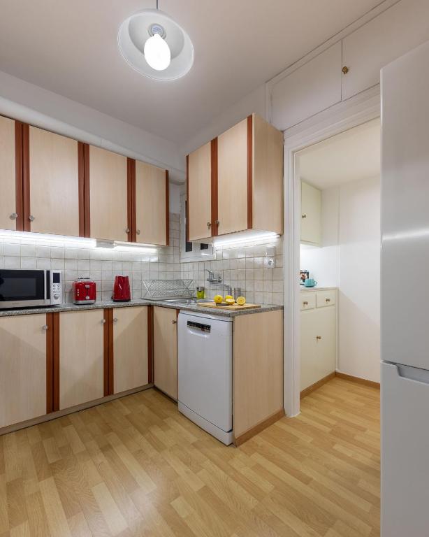 Kuchyňa alebo kuchynka v ubytovaní Luxury Museum Apartment Athena