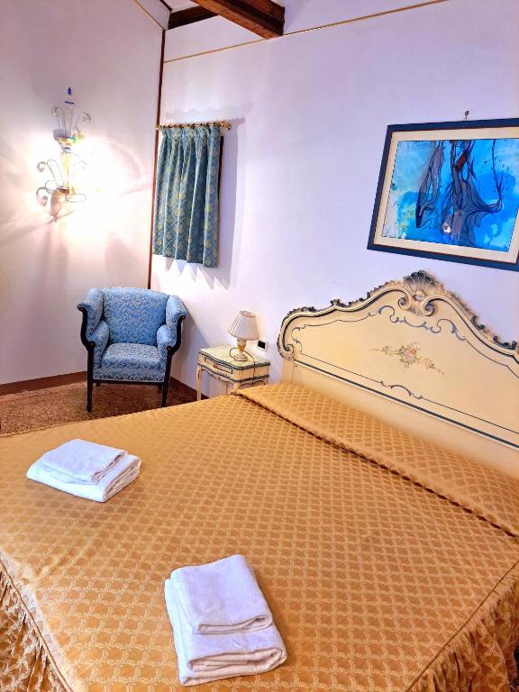 Postel nebo postele na pokoji v ubytování Locanda Ca' Formosa