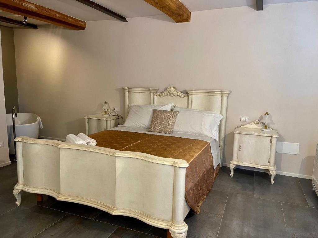 Postel nebo postele na pokoji v ubytování Agriturismo Albero del Latte
