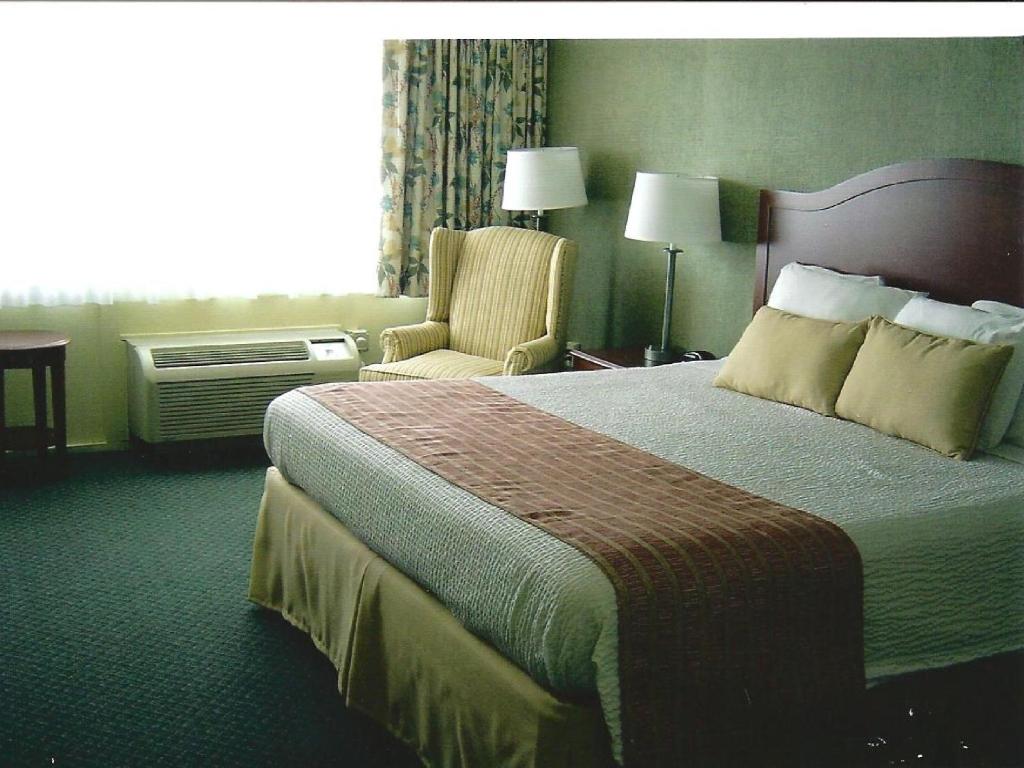 Postel nebo postele na pokoji v ubytování Pier 4 Hotel