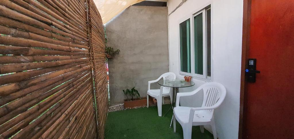 Patio nebo venkovní prostory v ubytování Home at Nimman