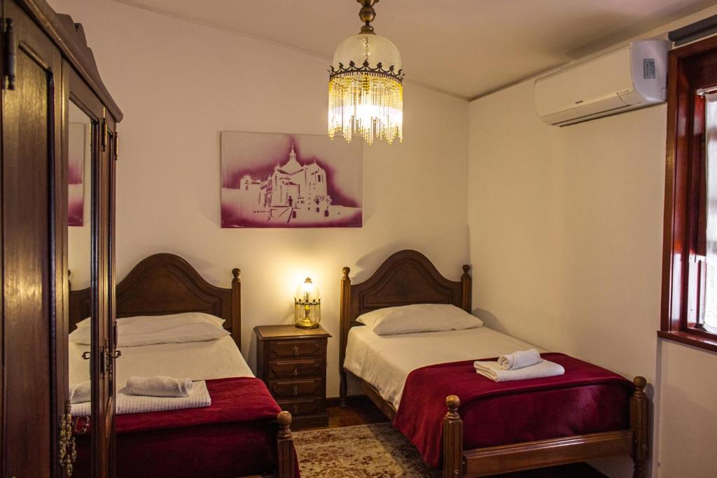 Uma cama ou camas num quarto em Casa do Ribeirinho