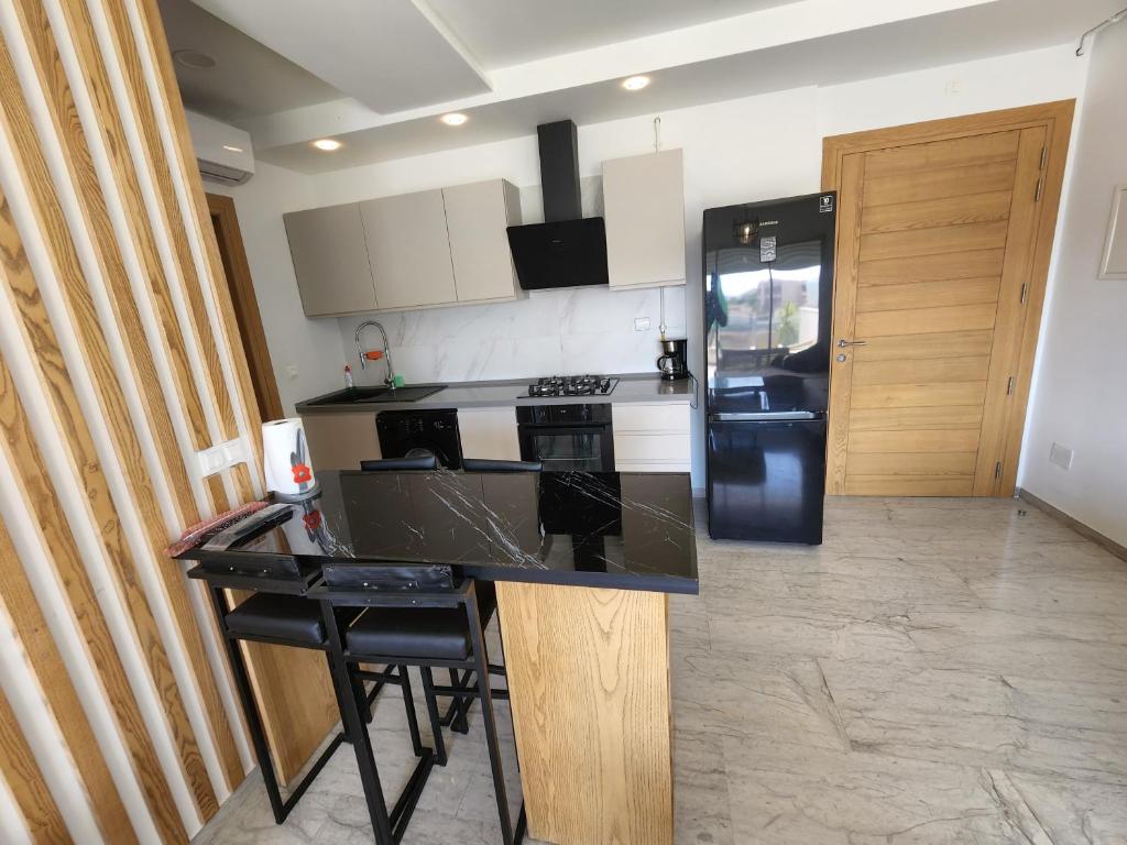 Kuchyň nebo kuchyňský kout v ubytování Horizon Appartment - Hammamet Nord