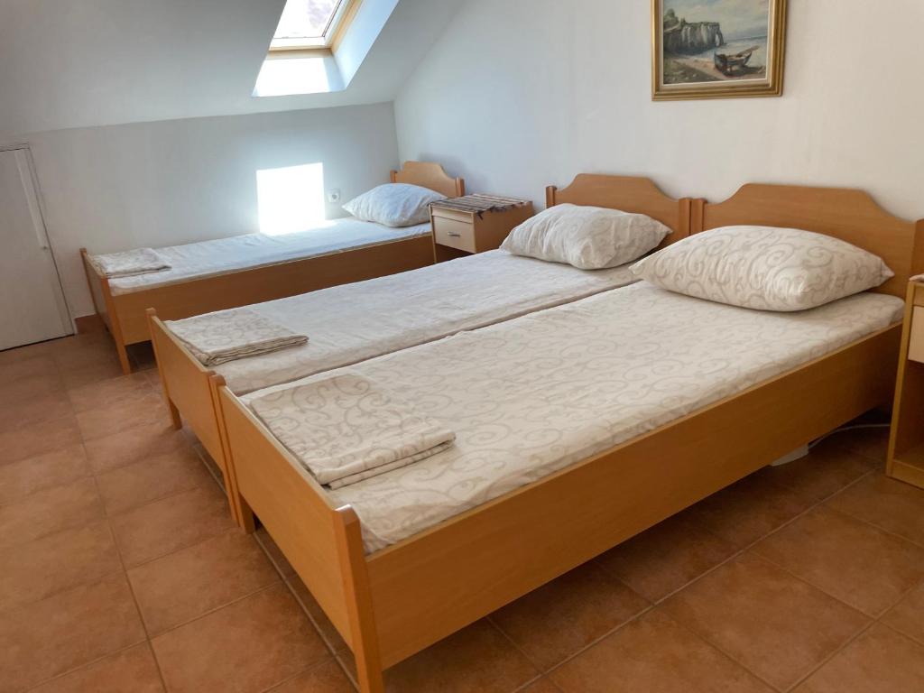 Posteľ alebo postele v izbe v ubytovaní Melita Apartements