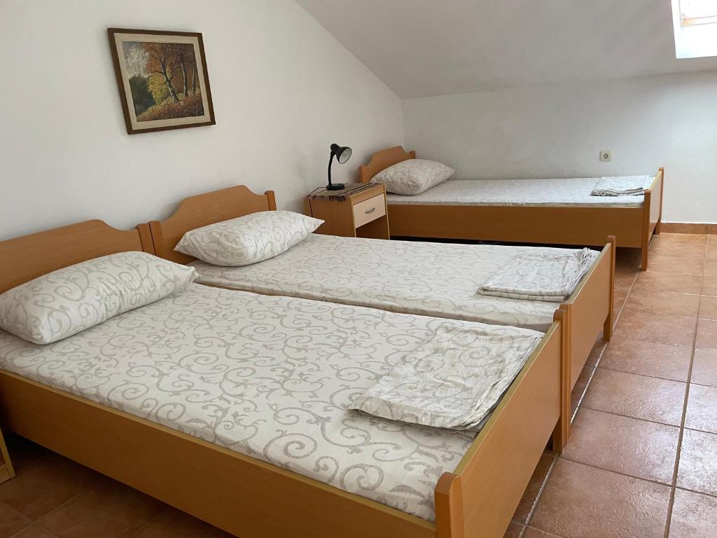 Posteľ alebo postele v izbe v ubytovaní Melita Apartements