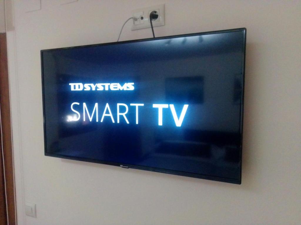 TV a/nebo společenská místnost v ubytování Casa Ferro