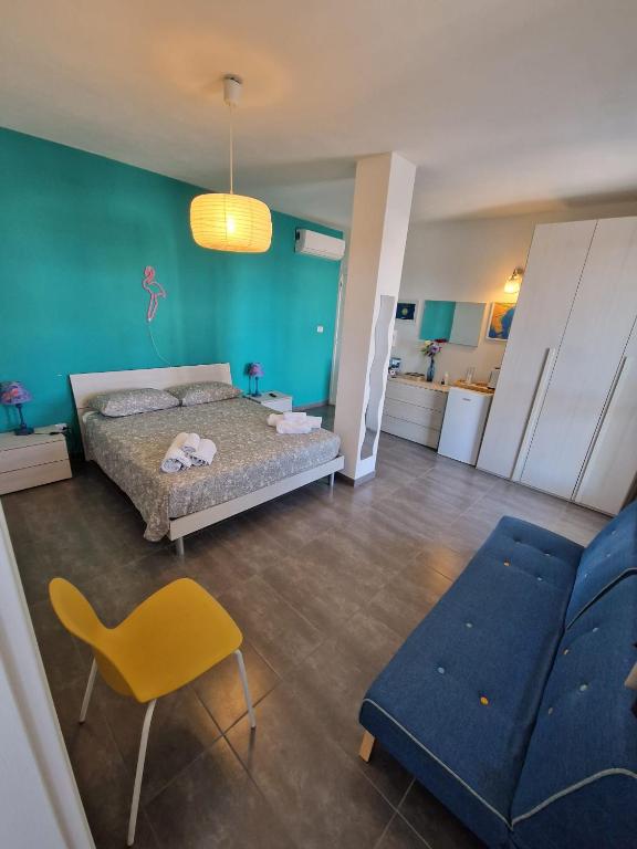 Postel nebo postele na pokoji v ubytování iMama' Rooms