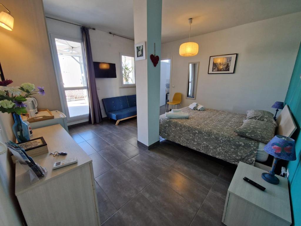 Postel nebo postele na pokoji v ubytování iMama' Rooms