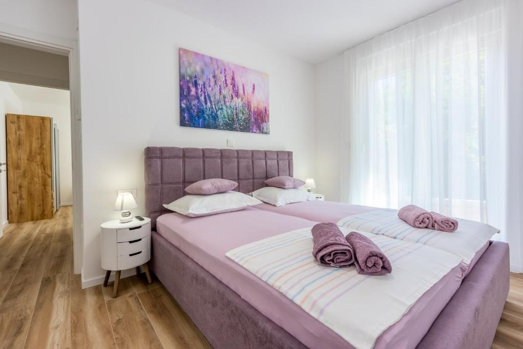 Voodi või voodid majutusasutuse Villa Una toas