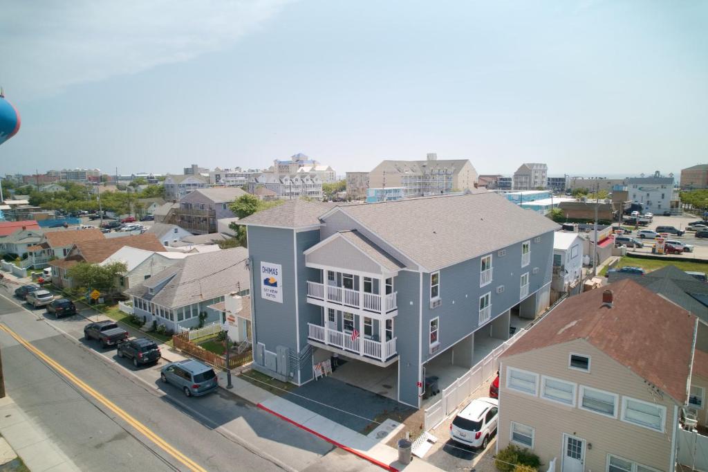 an aerial view of a city with a blue building at Dhimas Bayview Suites in Ocean City