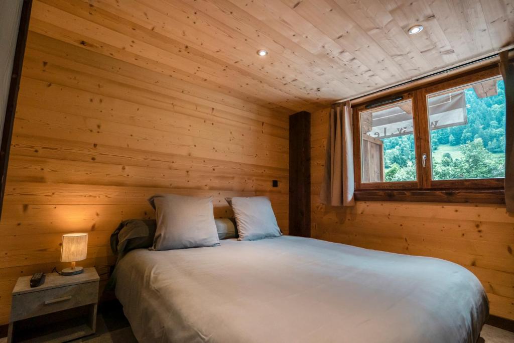 Postel nebo postele na pokoji v ubytování CHALET LES CERFS