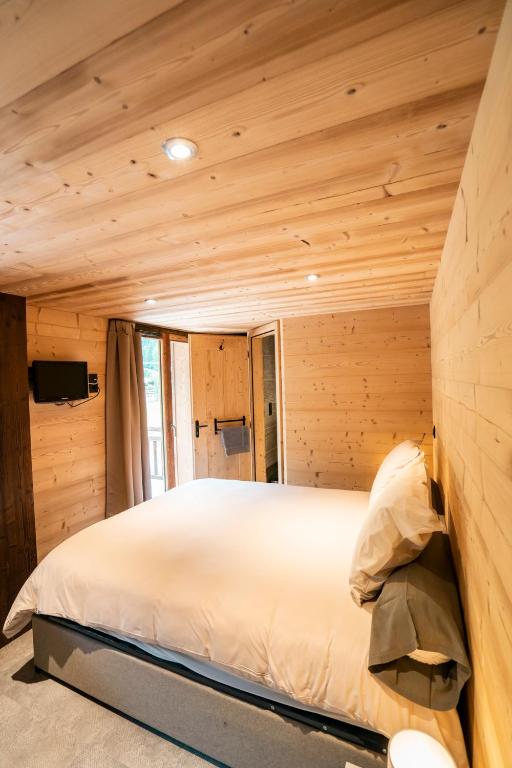 Postel nebo postele na pokoji v ubytování CHALET LES CERFS