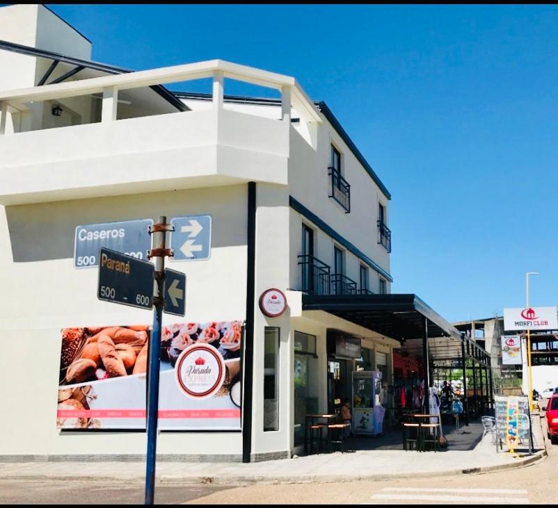 a store on a street with a sign in front of it at BY DANIELS in Federación