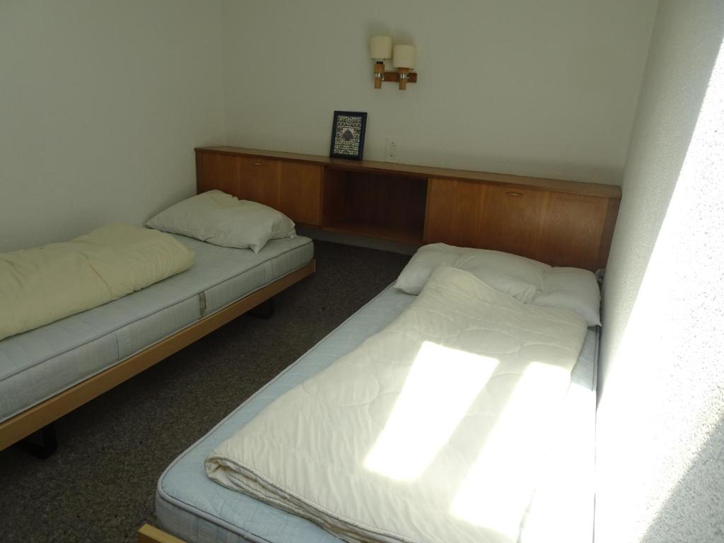 Postel nebo postele na pokoji v ubytování Fortuna 307