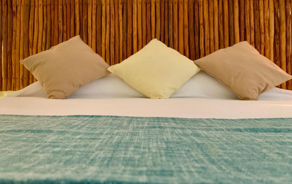 Postel nebo postele na pokoji v ubytování Mis Sueños Holbox