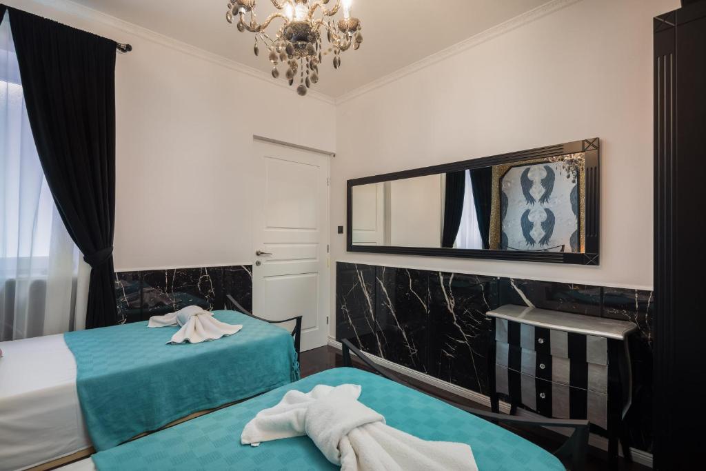 Posteľ alebo postele v izbe v ubytovaní Bajamonti apartment with amazing Split city view