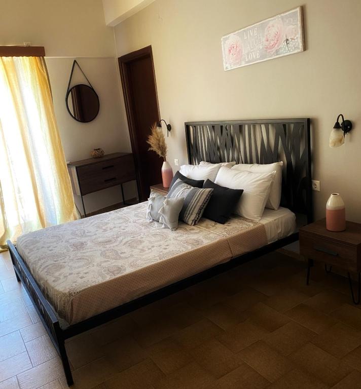 Postel nebo postele na pokoji v ubytování Kokkala Guestrooms