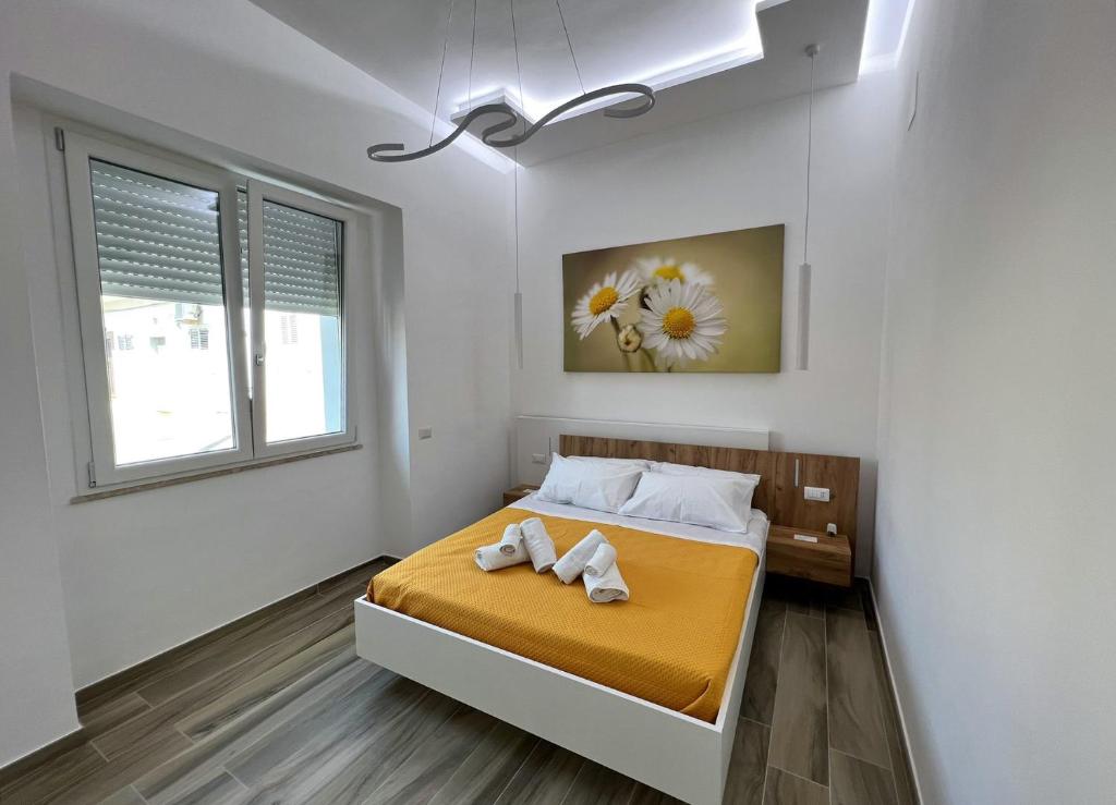 Una cama o camas en una habitación de in Via Margherita