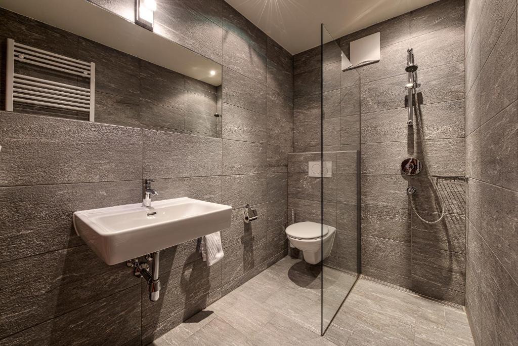Koupelna v ubytování Atelier Garni Astei