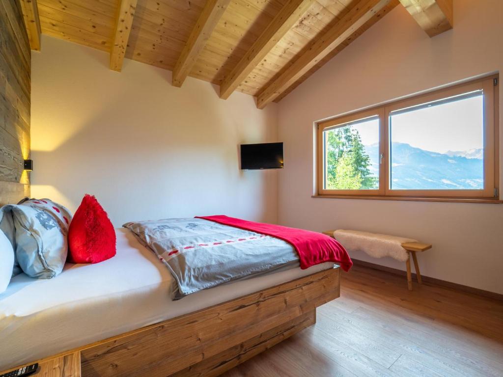 Postel nebo postele na pokoji v ubytování Chalet Georg