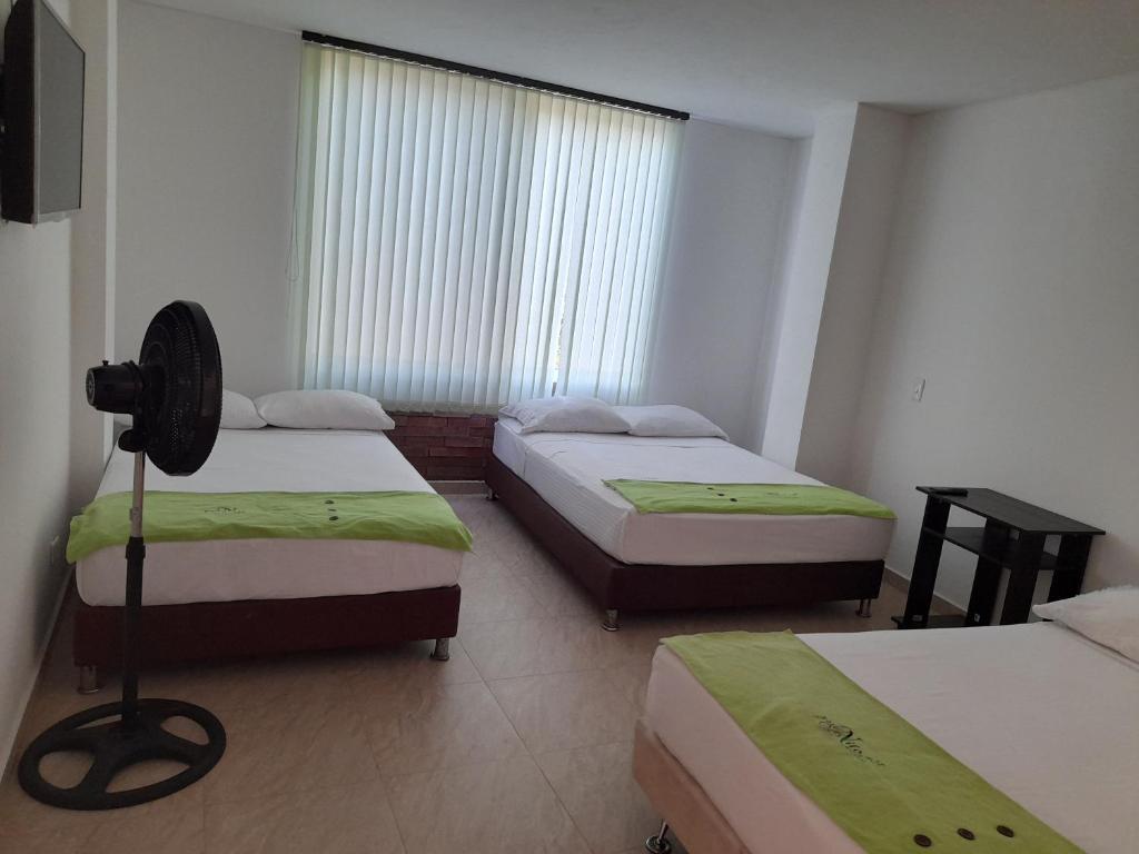 Postel nebo postele na pokoji v ubytování Econilonatural