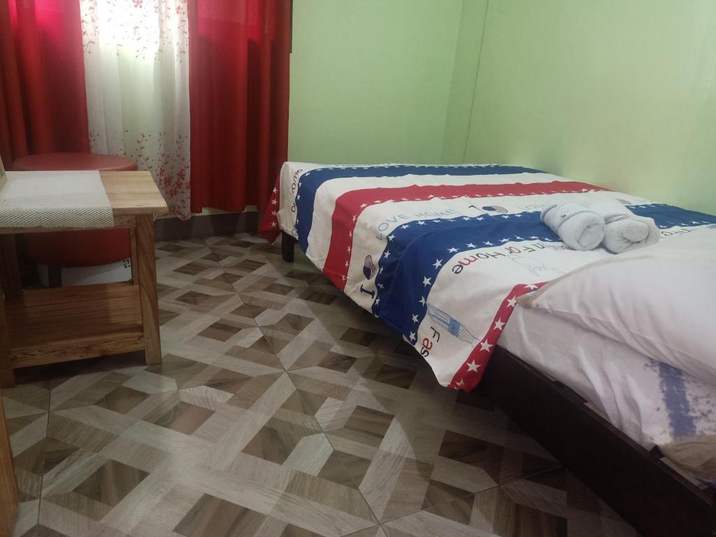 Postel nebo postele na pokoji v ubytování JO-ZA-NA's Hostel(bed and breakfast)
