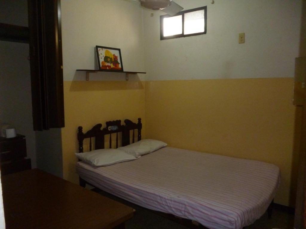 Postel nebo postele na pokoji v ubytování Villa Celeste