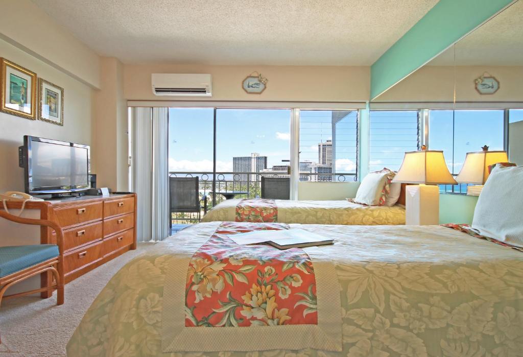 Castle Waikīkī Shore - Société De Vue Sur L'océan De Luxe De Luxe