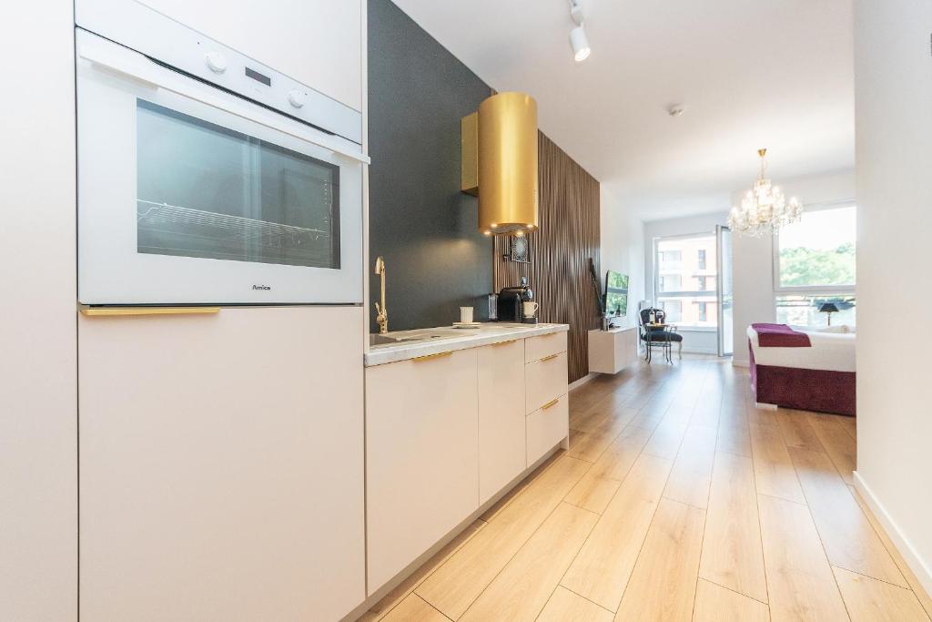 Kuchyňa alebo kuchynka v ubytovaní Bastion Wałowa Apartament Śródmieście centrum Gdansk