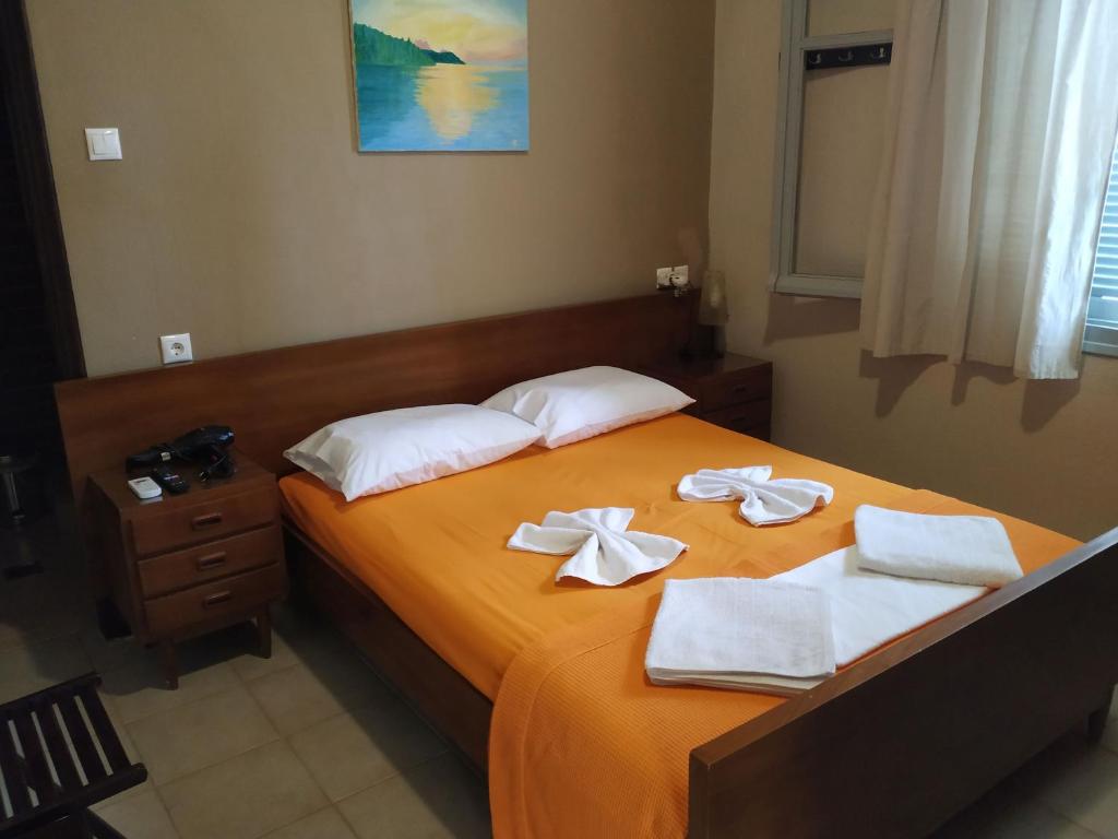 Postel nebo postele na pokoji v ubytování GIOTAS APARTMENTS - STUDIOS