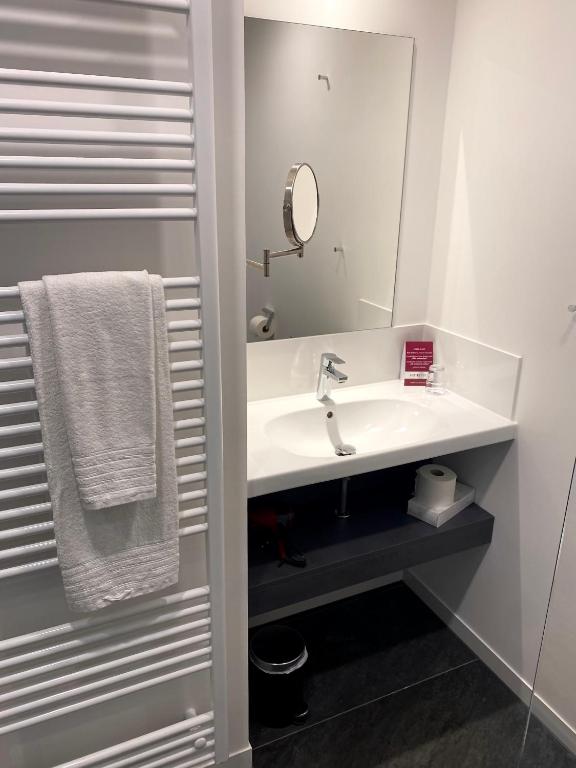 Koupelna v ubytování Hotel Wallern Garni