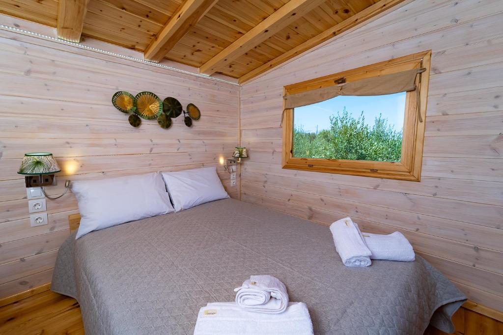 Postel nebo postele na pokoji v ubytování Thalassa Green