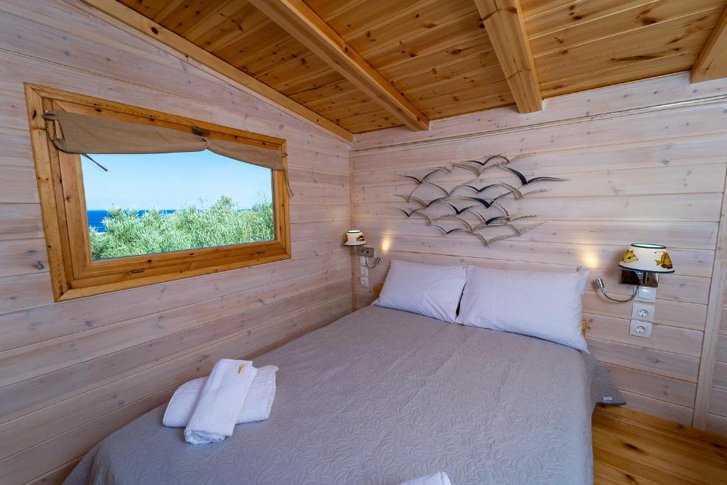 Postel nebo postele na pokoji v ubytování Thalassa Green