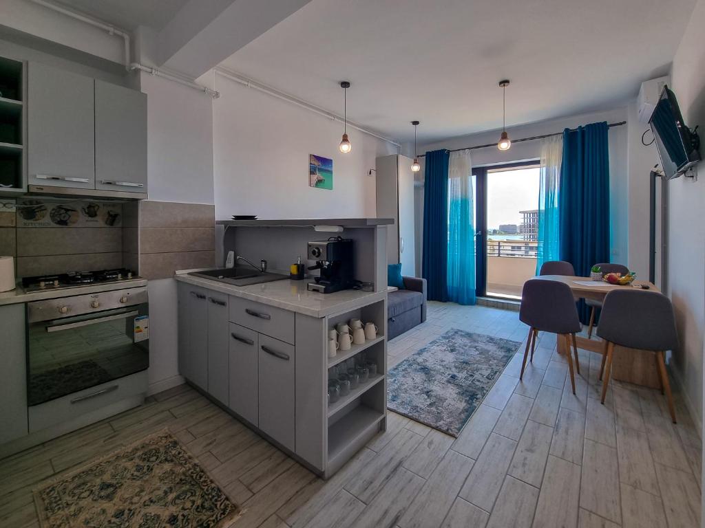 Kuchyň nebo kuchyňský kout v ubytování MafMaf Apartments