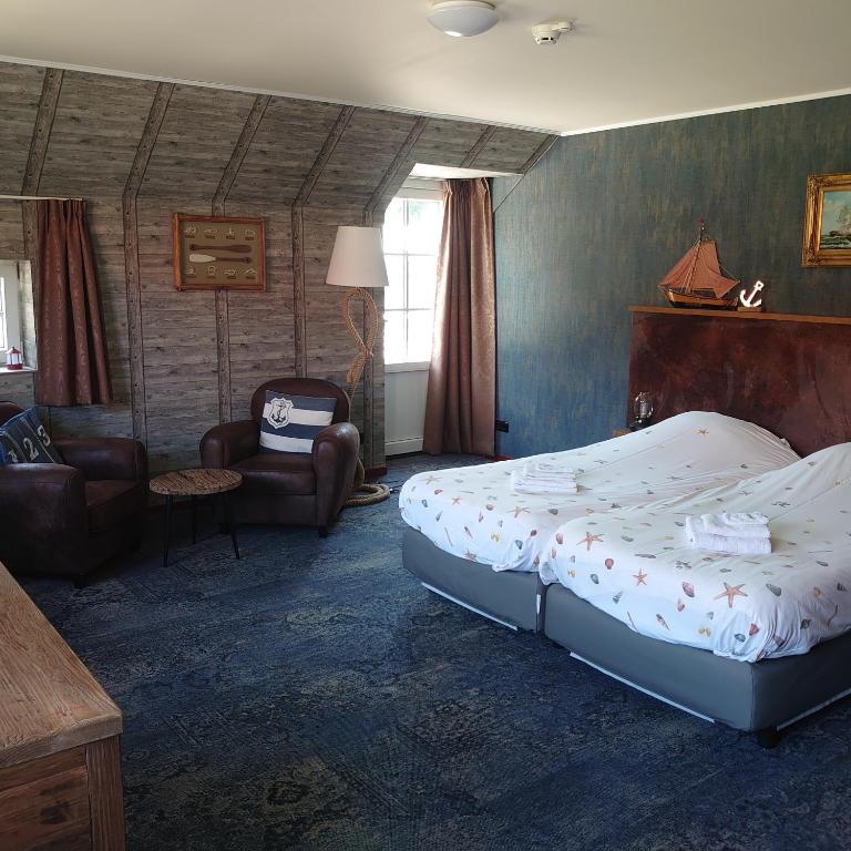 Postel nebo postele na pokoji v ubytování De Cyprian Bed & Breakfast