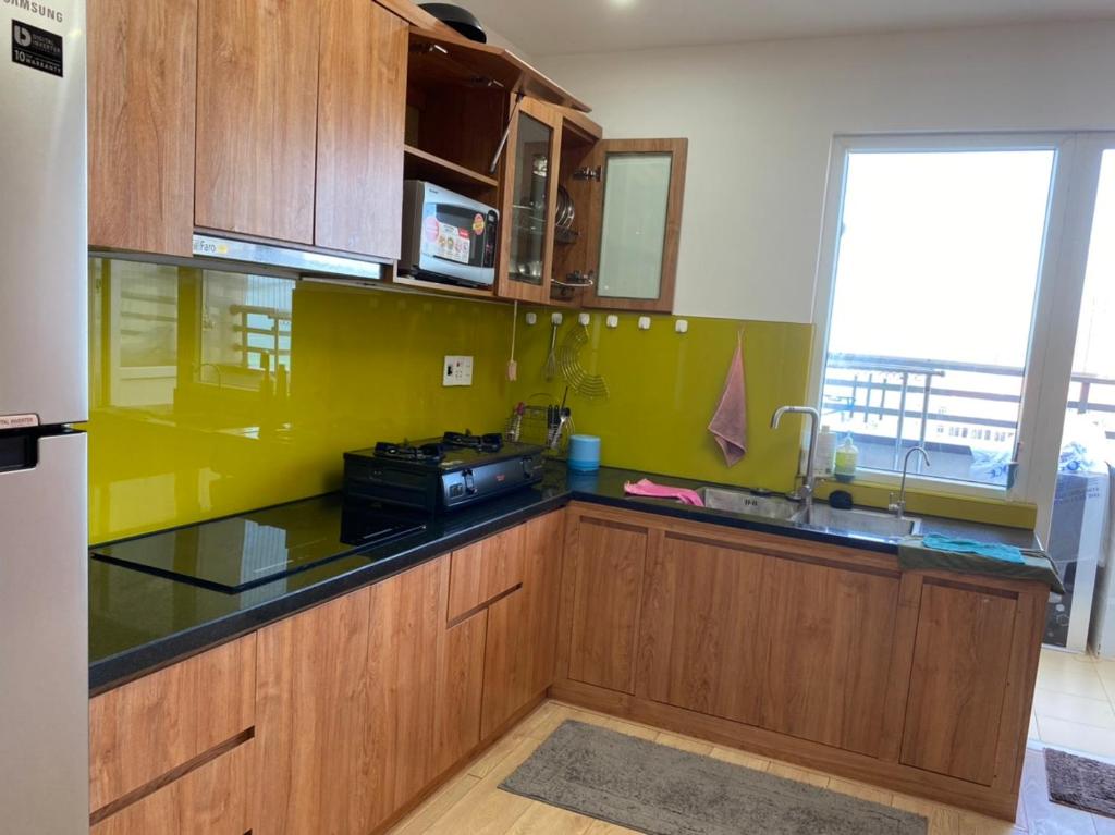 Kuchyň nebo kuchyňský kout v ubytování LH APARTMENT DA NANG