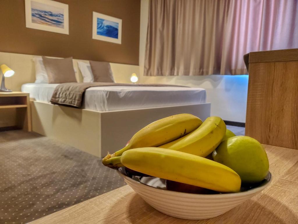 Postel nebo postele na pokoji v ubytování Hotel Argentum