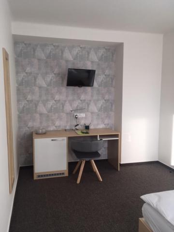 TV a/nebo společenská místnost v ubytování Hotel Trim